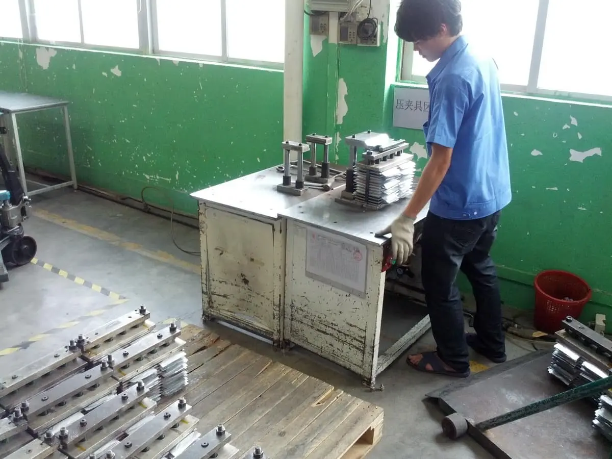 After first charge, cells are strongly compressed.