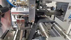 Machines attach tabs and cut electrodes to length.